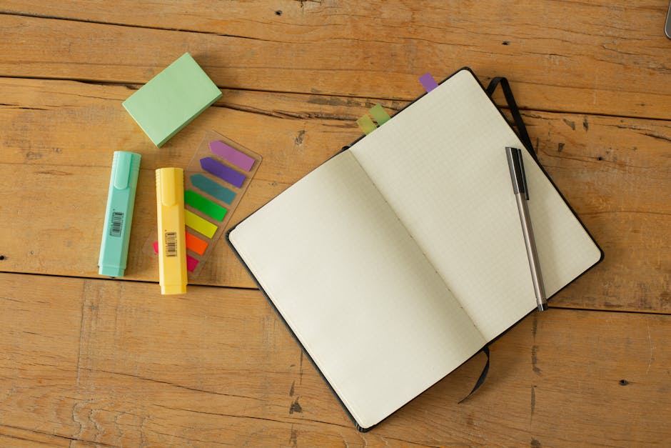 Study planner with notes and pen on a wooden desk