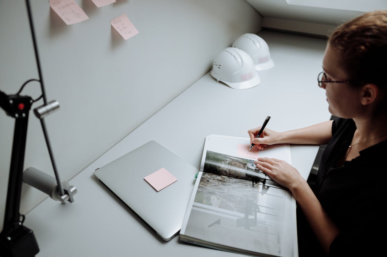 Student planning career skills and learning strategy in notebook